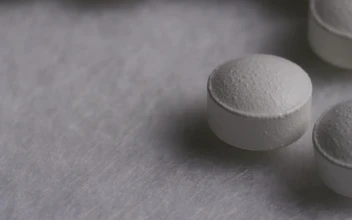 Video Stock Close Up Of White Pills Rotating For PC