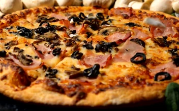 Video Stock Chopped Mushrooms Dropping Onto A Pizza For PC