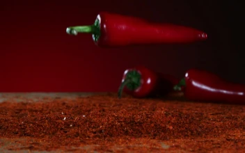 Video Stock Chili Pepper Falling Into Red Powder For PC
