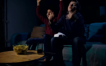 Video Stock Children On A Sofa With Snacks Watching A Movie For PC