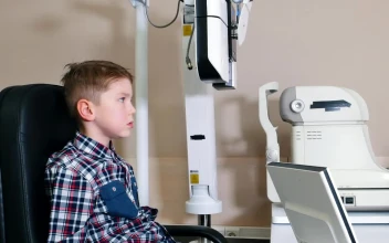 Video Stock Child Putting His Eyesight On An Eye Test Device For PC