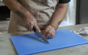 Video Stock Chef Skillfully Mincing A Garlic For PC