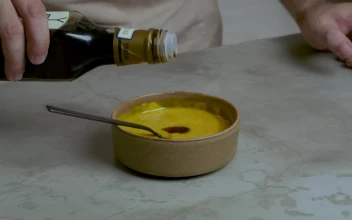 Video Stock Chef Preparing A Mixture In A Small Container For PC