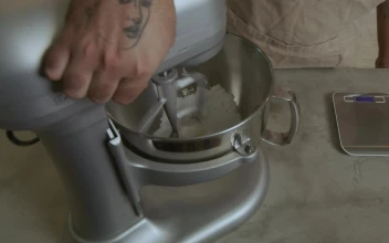 Video Stock Chef Beating A Mixture In An Electric Mixer For PC