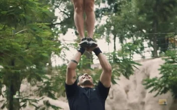 Video Stock Cheerleader Boy Catching His Partner After A Pyramid For PC