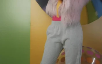 Video Stock Cheerful Girl Recording Herself With A Colorful Background For PC