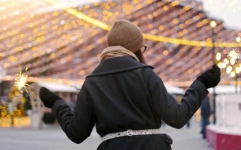 Video Stock Cheerful Girl Holding Sparklers On A Cold Day At Christmas For PC