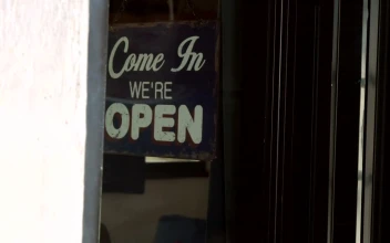 Video Stock Changing A Shop Sign To Closed For PC