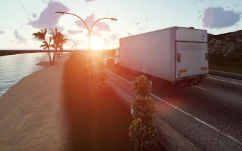 Video Stock Cars Traveling On A Highway During A Sunset For PC