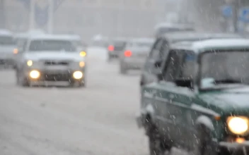 Video Stock Cars Driving Along A Snow Covered Street For PC