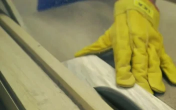 Video Stock Carpenter Slicing A Wooden Board In A Close Up Shot For PC