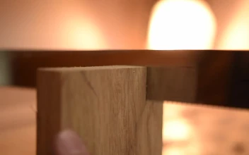 Video Stock Carpenter Sawing A Piece Of Wood Close Up For PC