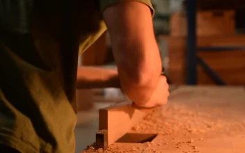 Video Stock Carpenter Sanding A Wood In His Workshop For PC