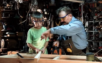 Video Stock Carpenter And Grandson In The Workshop For PC