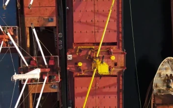 Video Stock Cargo Ship Tied On A Coastline Viewed From Above For PC