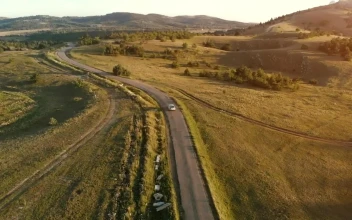 Video Stock Car Traveling In A Countryside Road Aerial Shot For PC