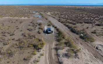 Video Stock Car Passing Through A Puddle In The Plain For PC