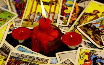 Video Stock Candles Burning Between Cards For PC