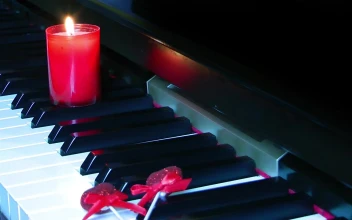 Video Stock Candle On A Piano Keyboard For PC