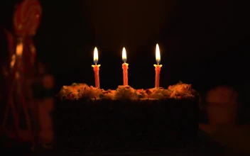 Video Stock Cake With Burning Candles In The Dark For PC