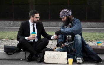 Video Stock Businessman With Homeless On The Street For PC