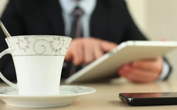 Video Stock Businessman With A Tablet Drinking Coffee For PC