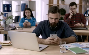 Video Stock Businessman Using His Phone In The Office For PC