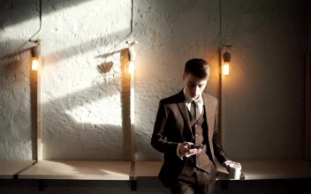 Video Stock Businessman Using A Mobile Phone For PC
