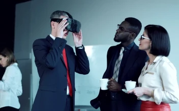Video Stock Businessman Trying A Virtual Reality Headset For PC
