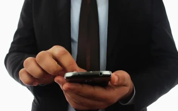 Video Stock Businessman Texting With A Smartphone For PC