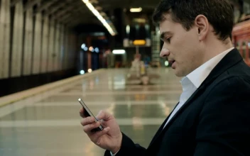 Video Stock Businessman Texting While Waiting In The Subway For PC