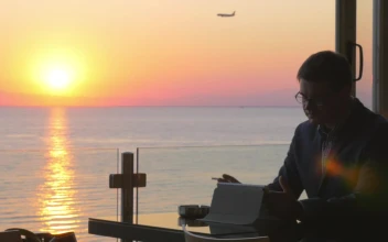 Video Stock Businessman Smoking And Looking At A Plane For PC
