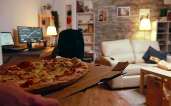 Video Stock Businessman Sitting Down With A Takeaway Pizza For PC