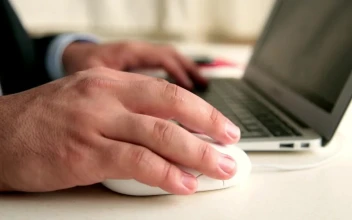 Video Stock Businessman In Suit Working On A Macbook For PC