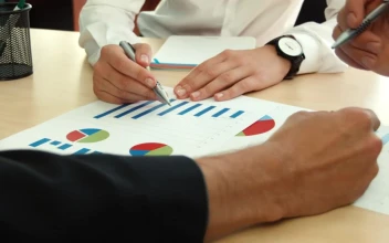 Video Stock Businessman Discussing Business Charts For PC