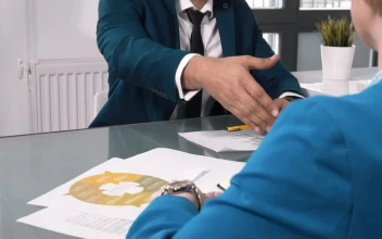 Video Stock Businessman And Client Handshake Over Project Plan For PC