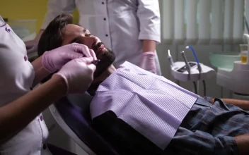 Stock Video Dentist Working With A Male Patient For PC