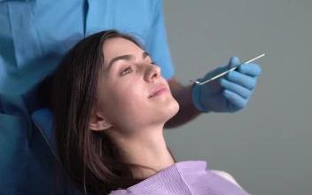 Stock Video Dentist Uses Mirror To Check Patient Teeth For PC