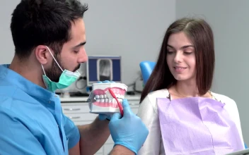 Stock Video Dentist Shows Woman Proper Teeth Brushing For PC