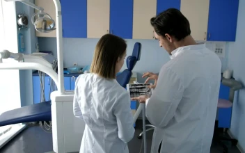 Stock Video Dental Staff Using A Tablet Computer For PC