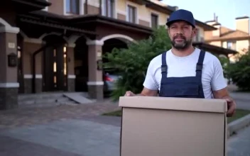 Stock Video Delivery Man Carrying A Large Box  Smal For PC