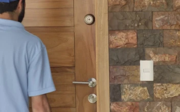 Stock Video Delivering A Package To The Door Of A House For PC