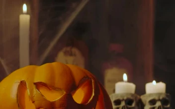 Stock Video Decorated For Halloween With Candles A Pumpkin And Cobwebs For PC