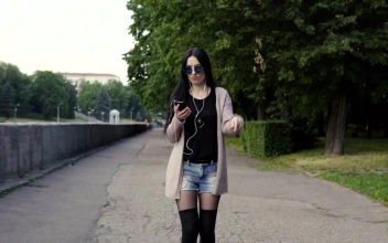 Stock Video Dancing While Walking Down The Street For PC