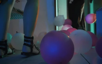 Stock Video Dancing And Playing With Balloons At A Costume Party For PC