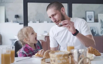 Stock Video Dad Plays Spoon Airplane With Little Girl For PC