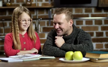 Stock Video Dad Helping His Daughter With Her Homework For PC