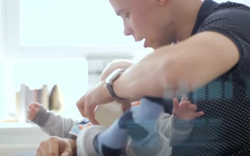 Stock Video Dad Feeding Baby With A Baby Bottle For PC
