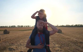 Stock Video Dad Carrying His Daughter For PC