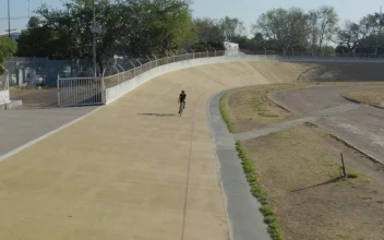 Stock Video Cyclist On A Cycling Track In A Park For PC